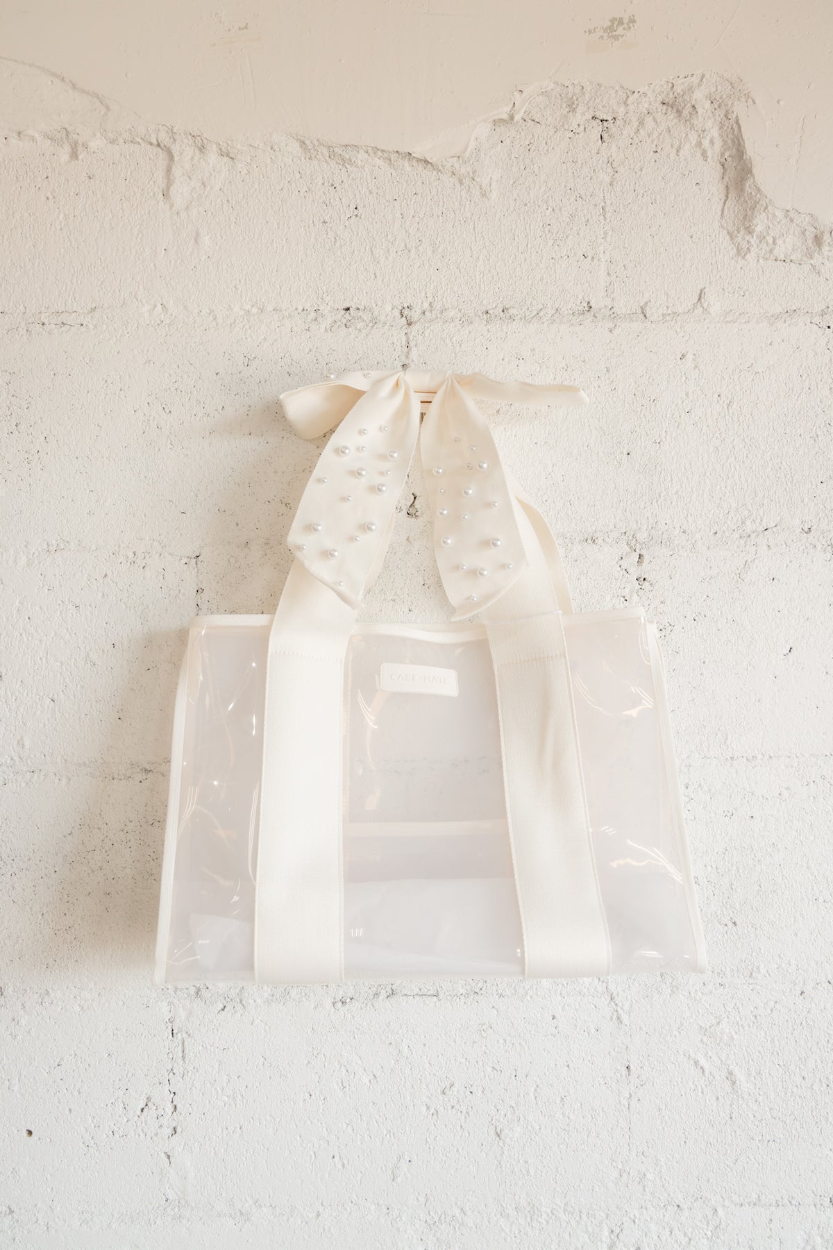 Case-Mate Ivory Pearl Bow Jelly Tote Bag