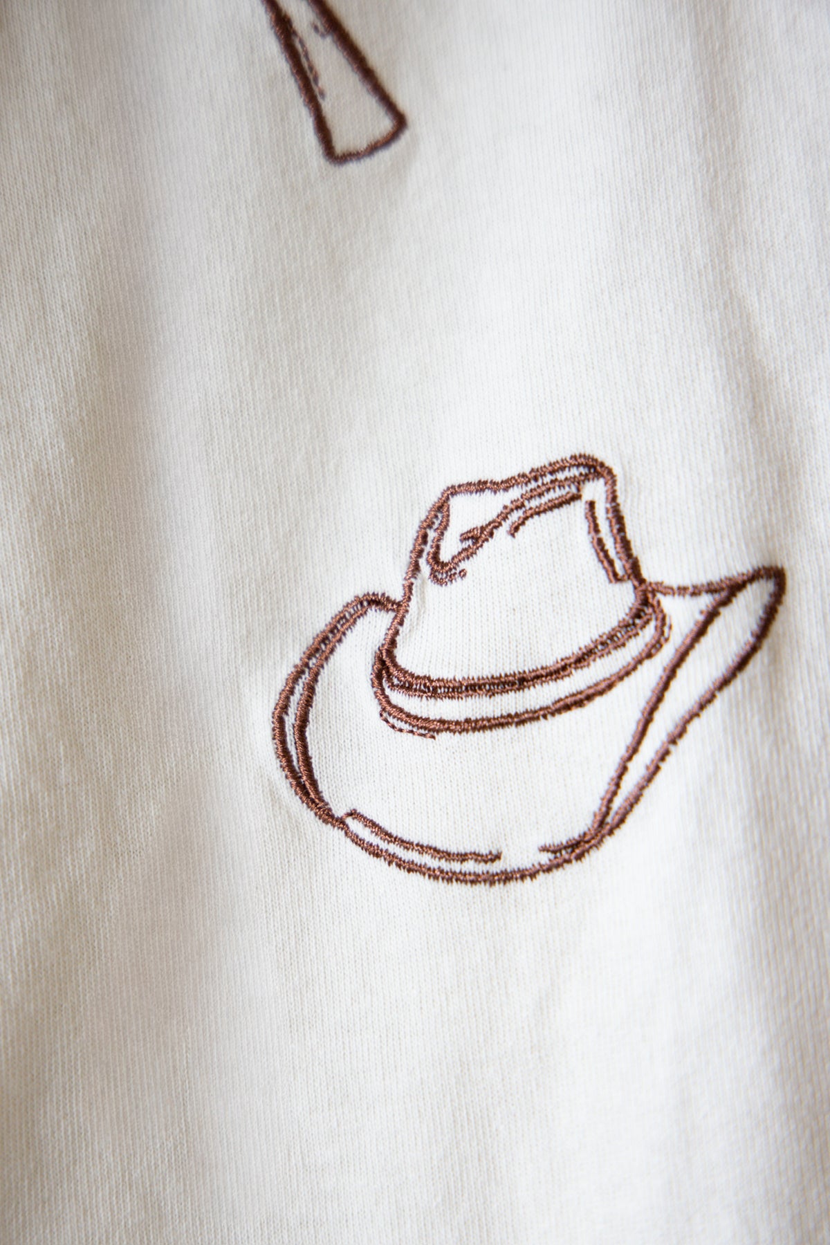 RAISONNEL Cowboy Embo Tee